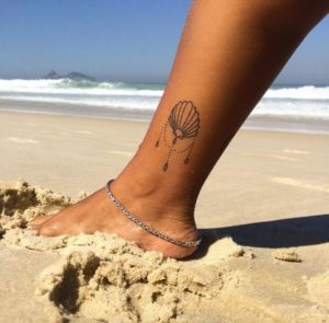 45 Beautiful Seashell Tattoos You’ll Love